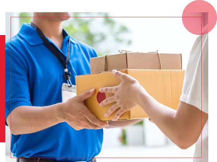 A person handing another person something in a box